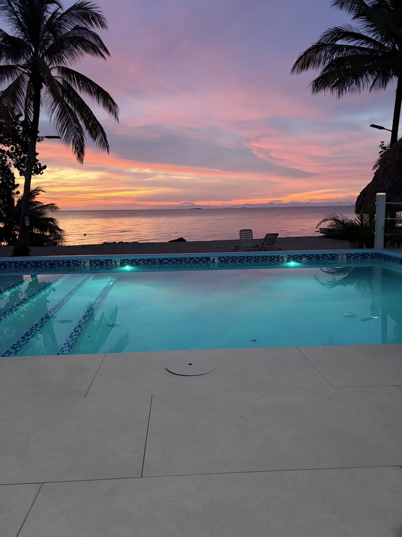 The pool at sunset over the Caribbean