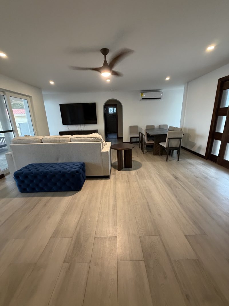 Wide living room toward the arch